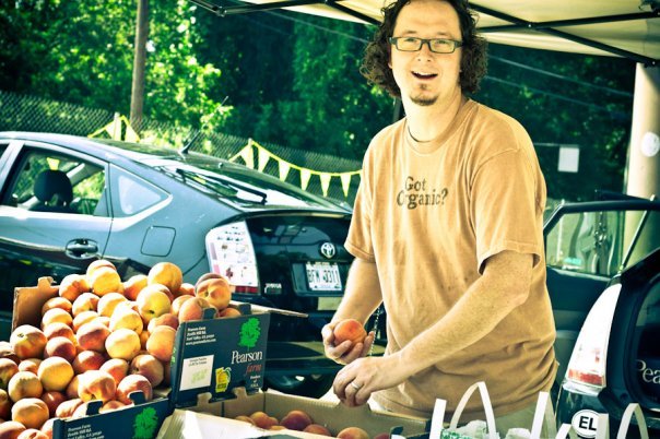 Doug Williams selling peaches at the ELF Market